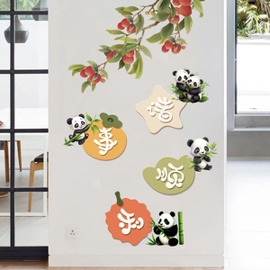 Detail of creative panda wall stickers with lucky Chinese characters on a white wall