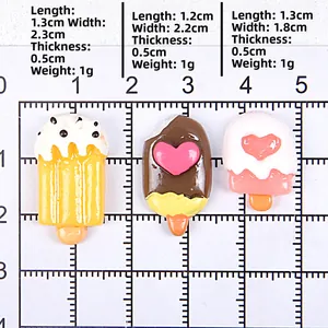 Size comparison chart for miniature resin dessert charms with measurement scale