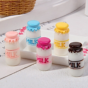 Miniature dollhouse milk bottles in five vibrant colors with embossed MILK lettering