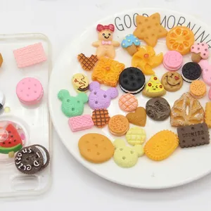 Assorted DIY resin charms featuring cookie and Mickey shapes for phone case decoration
