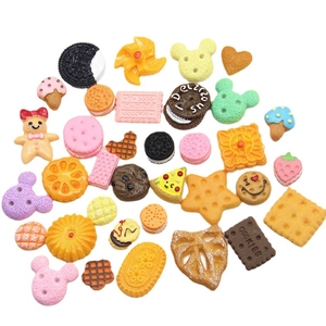Assorted colorful resin cookie charms for DIY craft projects and cake decoration