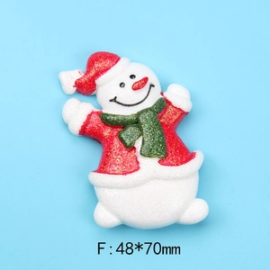 Detailed macro view of a glittery resin Christmas snowman charm with 48x70mm size markings
