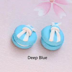 Detail of blue macaron bow charms for DIY phone case making and crafts