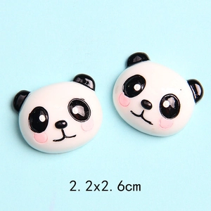 Macro view of 2.2x2.6cm resin panda charms with glossy finish for DIY crafts