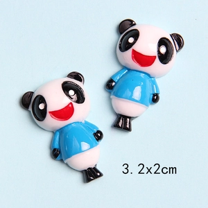 Macro detail of cartoon resin panda charms with 3.2x2cm dimensions for DIY crafts