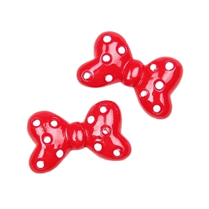 Red resin bow with white polka dots for DIY hair accessories and phone case decor