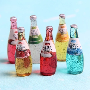 Miniature resin juice bottle charms in five colors with realistic chia seeds for DIY crafts