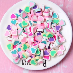Colorful heart-shaped polymer clay slices for DIY crafts and nail art decoration