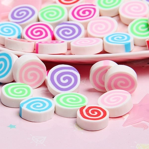 Macro shot of colorful spiral clay marshmallow charms for DIY crafts and case decor