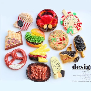 Collection of 12 detailed artificial food magnets including pizza and coffee styles