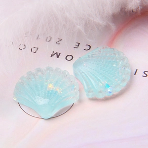 Lichtblauwe hars schelpen met glitters voor DIY telefoonhoesjes en creatieve hobby's