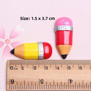 Miniature resin pencil charms in red and pink for DIY crafts measuring 1.5x3.7cm