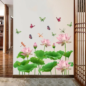 Detail of waterproof lotus and dragonfly wall stickers on a clean white living room wall