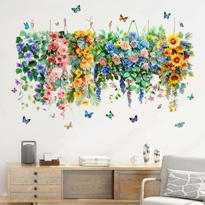 Detail of sunflower and butterfly wall decals displayed on a bright living room wall