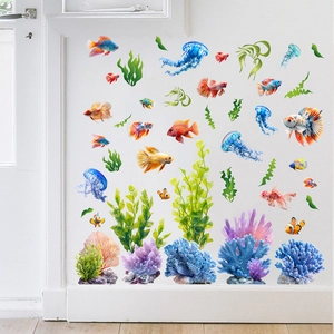 Detail of tropical fish, jellyfish and coral reef wall stickers on a clean white wall