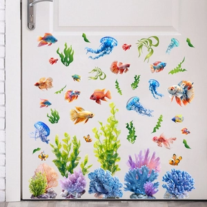 Self-adhesive ocean wall stickers with tropical fish, jellyfish and seaweed on a white door