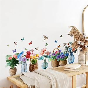 Detail of 3D hummingbird and floral wall stickers in a cozy home living room setting