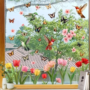 Static cling window decals with colorful hummingbirds, butterflies, and tulip flower garden