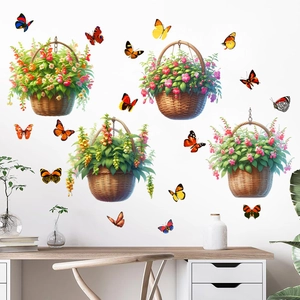 Détails des stickers muraux paniers de fleurs et papillons sur un mur blanc