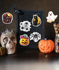 Detailed Halloween stickers set with ghosts, pumpkins, and bats in a festive decor display