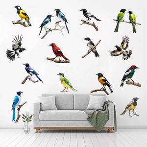 Vibrant self-adhesive bird wall decals featuring colorful parrots on branches above a sofa