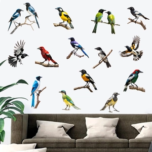 Realistic colorful bird wall stickers set above a cozy sofa for living room decor