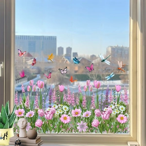 Static cling window film with pink tulips and colorful butterflies on glass surface
