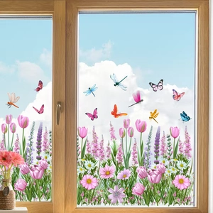Floral static window clings with pink tulips and butterflies on glass under blue sky