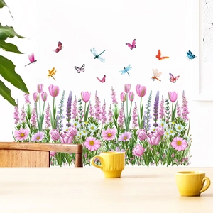 Detailed view of pink tulip floral wall stickers with butterflies in a cozy dining room