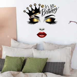 Bedroom wall decor showing birthday crown with red lips and eyelashes decal
