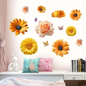 Detail of floral wall stickers with daisies roses and butterflies in a warm nursery room