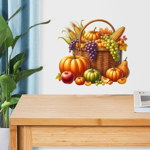 Detail of harvest fruit basket wall sticker with pumpkins and grapes on a white wall
