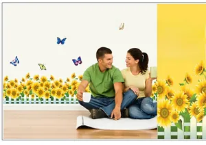 Détail des stickers tournesols jaunes avec clôture blanche et papillons multicolores