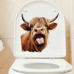 Sticker vache des Highlands imperméable avec langue sortie sur couvercle WC blanc
