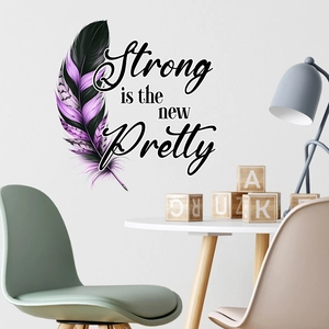 Detail of waterproof feather wall sticker with 'Strong is the new Pretty' quote