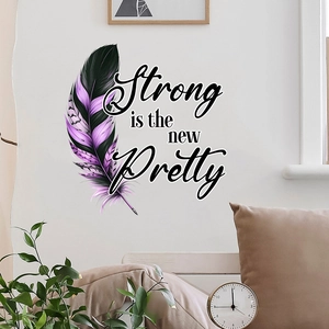 Detail of waterproof wall sticker with feather design and Strong is the new Pretty text
