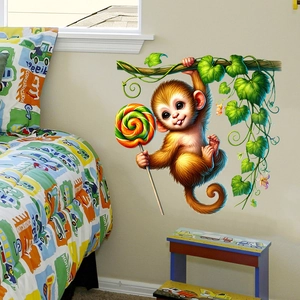 Detailed close-up of cartoon monkey wall sticker with lollipop for kids room decoration