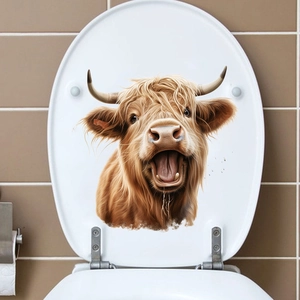 Sticker étanche motif vache Highland écossaise sur un abattant de WC blanc épuré