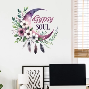 Detail of Gypsy Soul wall sticker with purple moon, flowers, and feathers above a desk