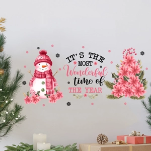 Detail of Christmas wall decal with watercolor snowman and festive slogan in pink tones