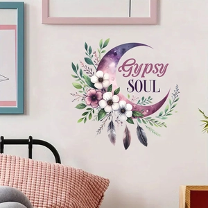 Close-up of Gypsy Soul moon and feather wall decal in a cozy bedroom setting