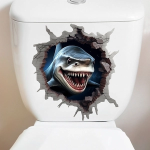 Detailed view of a 3D shark wall sticker breaking through on a ceramic toilet surface