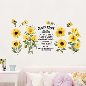 Detail of waterproof sunflower wall stickers and Family Recipe quote on bedroom wall