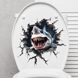 Detail shot of a 3D Great White Shark wall sticker applied on a white toilet lid cover
