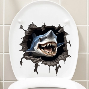 Macro view showing a realistic 3D shark wall sticker bursting through a modern toilet seat