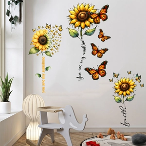 Detailed view of sunflower and butterfly wall decals with You Are My Sunshine quote