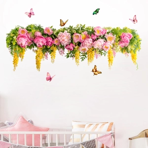 Detail of floral wall stickers with pink peonies and colorful butterflies for nursery decor