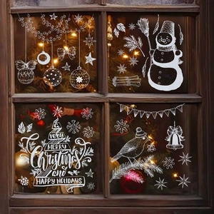 Weihnachtsfensterbilder mit Schneemann, Schneeflocken und festlichem Schriftzug auf Glas