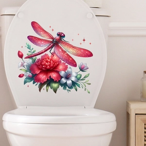 Detail of waterproof red dragonfly and floral self-adhesive sticker on white toilet lid