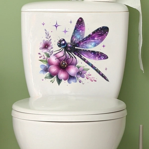 Detailed view of waterproof dragonfly floral sticker on a white ceramic toilet lid